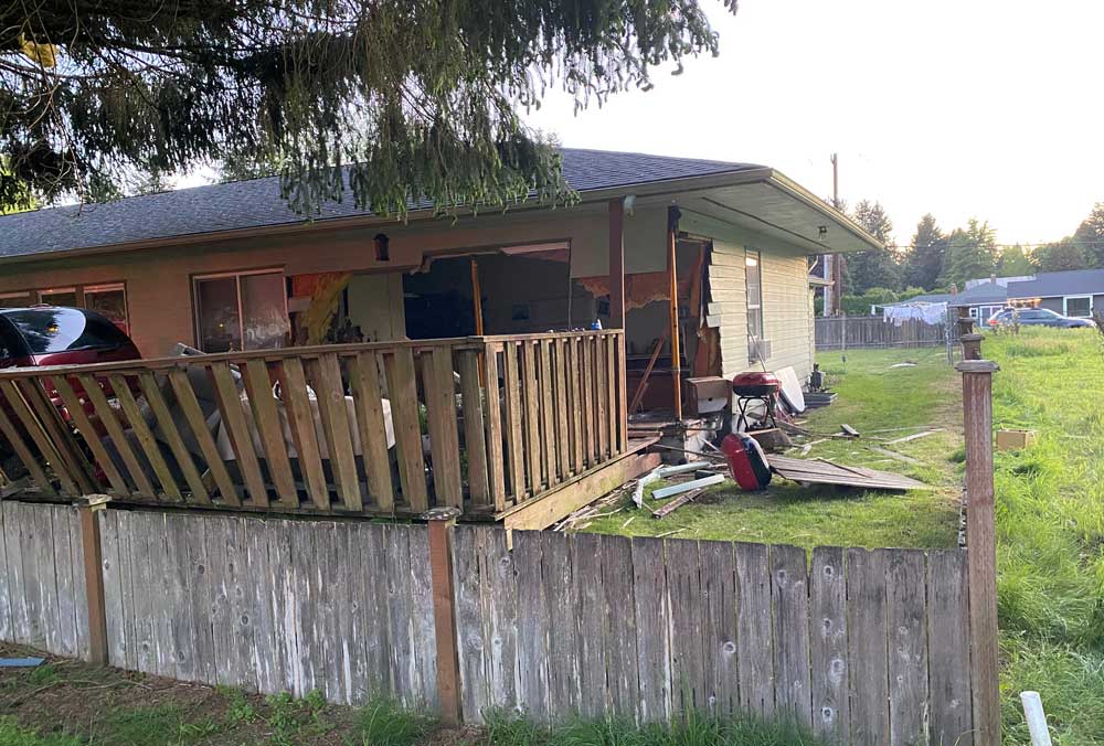 Sunday, May 14th: Impaired Driver Hits Capitol City House 1 The back view and path if damage at the Capitol City Golf Club Estates home on May 14, 2023.